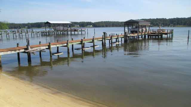 pier with oyster harvesting containers