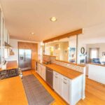 Renovated kitchen off dining area